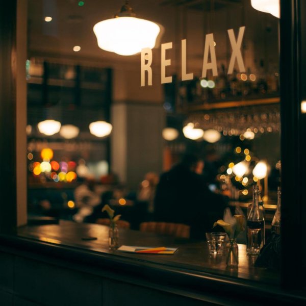 Image of the bar with a text saying Relax